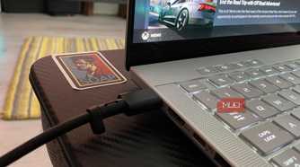 USB-C cable connected to a gaming laptop