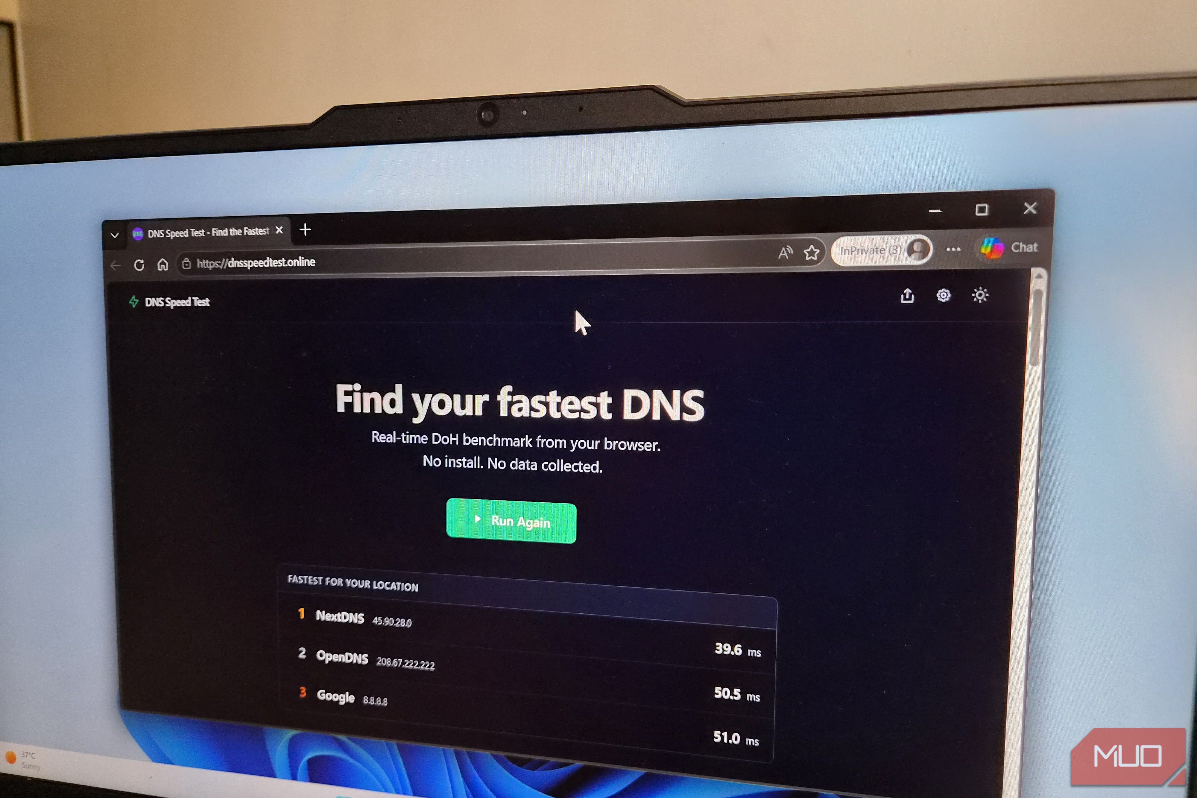 Laptop showing DNS speed test results