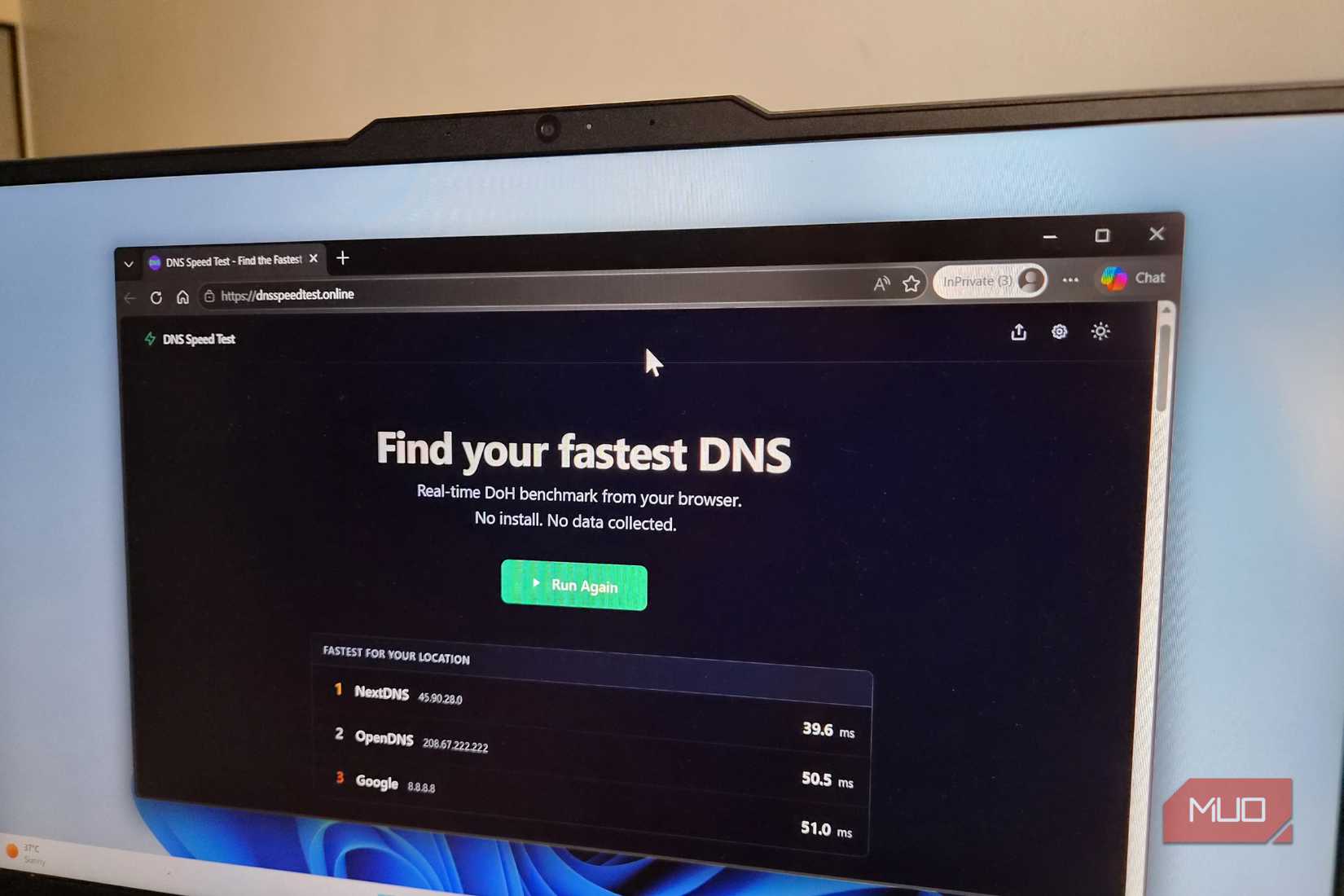 Laptop showing DNS speed test results