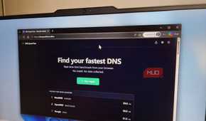 Laptop showing DNS speed test results