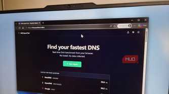 Laptop showing DNS speed test results