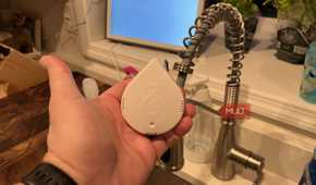 A Moen Leak Detector near a faucet