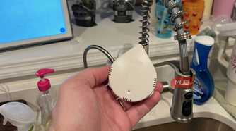 A Moen Leak Detector held