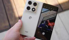The Motorola Razr Fold in the hand with the cover screen preview on.
