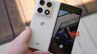 The Motorola Razr Fold in the hand with the cover screen preview on.