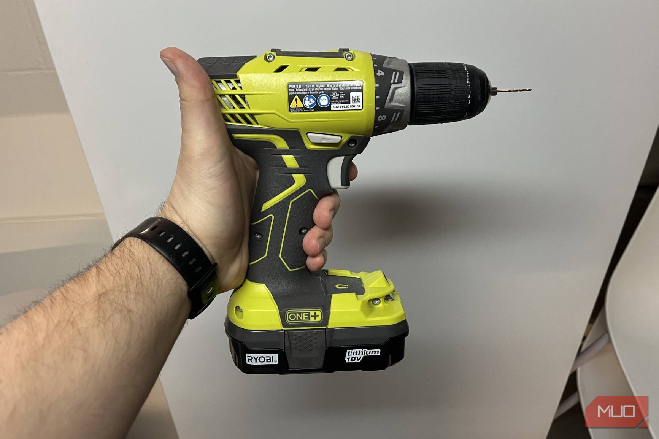 The side of a RYOBI ONE drill driver