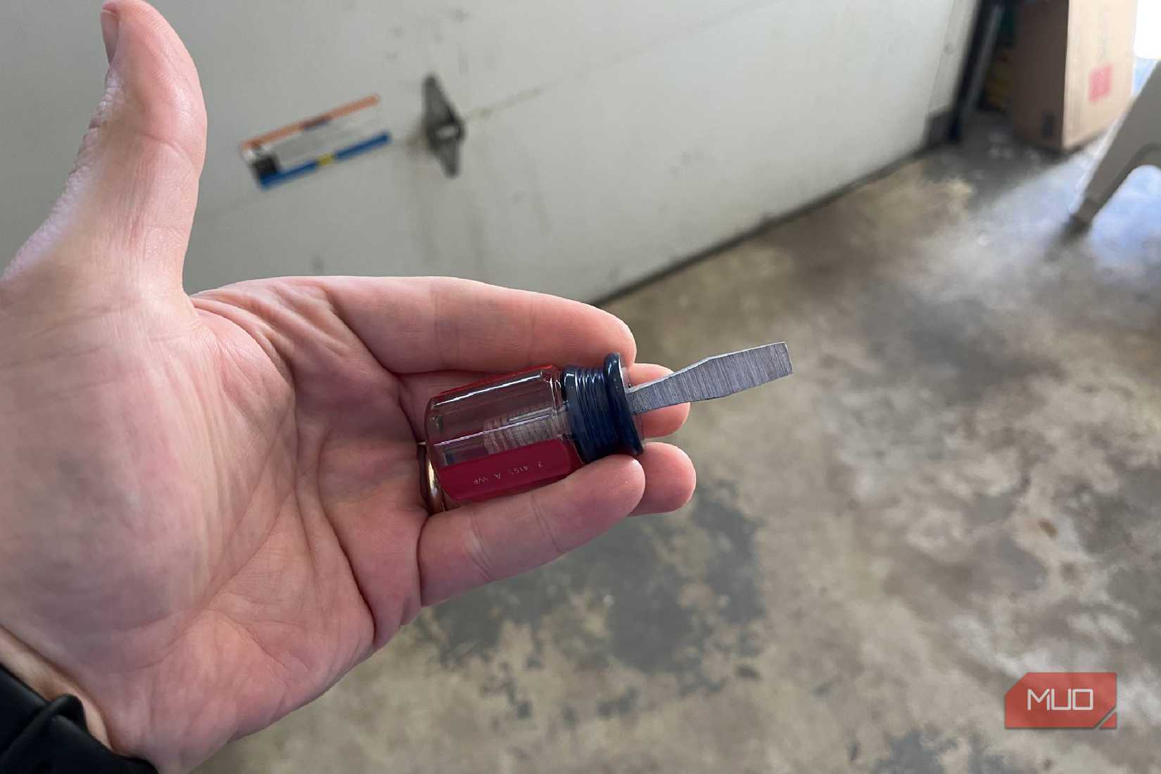 A shortened flathead screwdriver