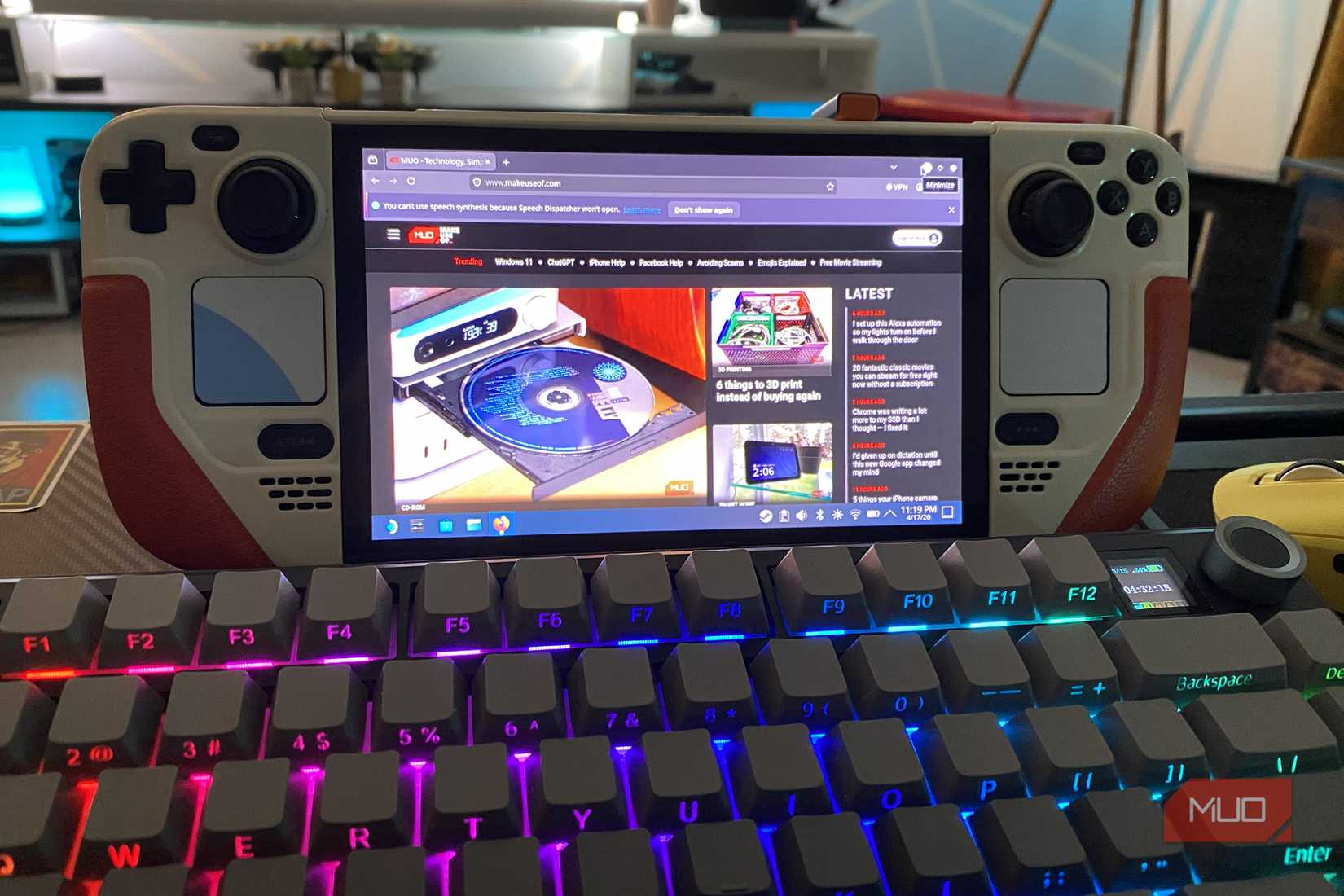 Steam Deck OLED in Desktop Mode showing MUO homepage 