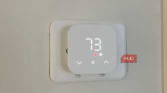 Amazon Smart Thermostat on a wall