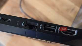 USB-C, Ethermet, USB-A with SS symbol and HDMI port on a HP Pavillion laptop
