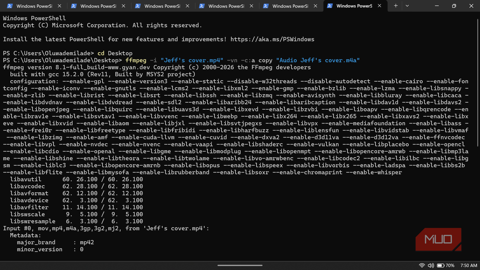 Windows PowerShell window executing an FFmpeg command to extract audio from a video file.