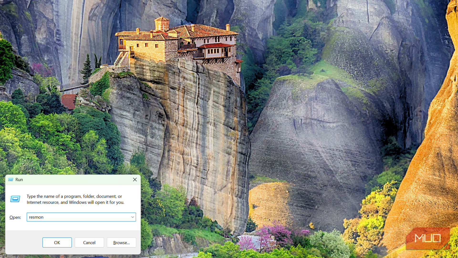 Windows Run dialog box with 'resmon' typed in to open Resource Monitor.