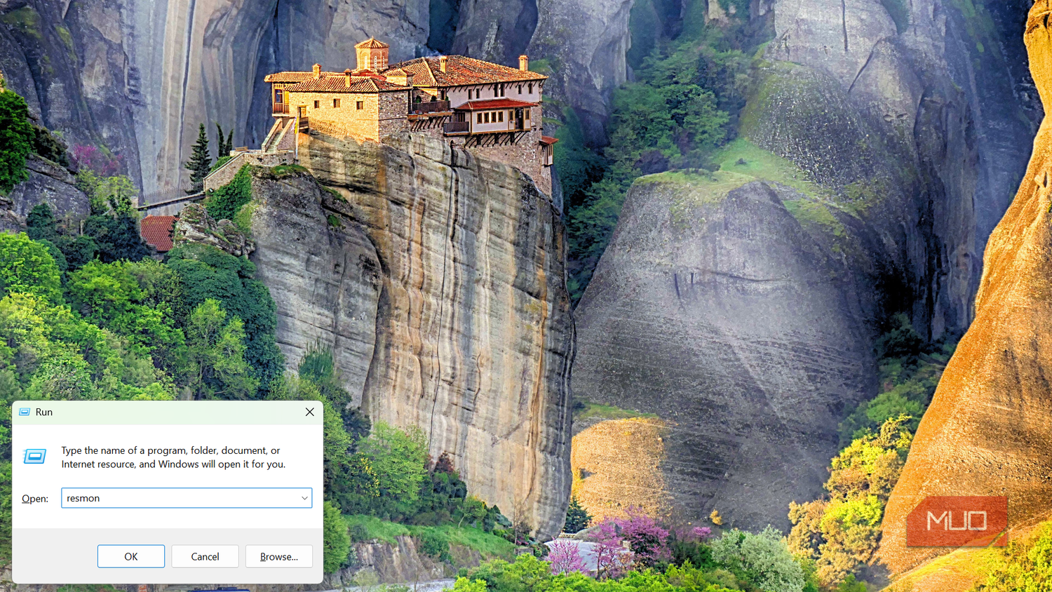 Windows Run dialog box with 'resmon' typed in to open Resource Monitor.