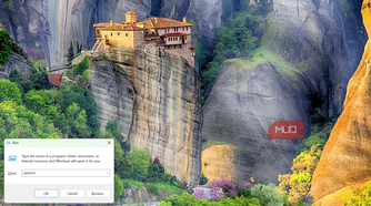 Windows Run dialog box with 'resmon' typed in to open Resource Monitor.