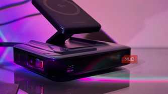 wireless charging pad on black charging dock with purple neon lighting