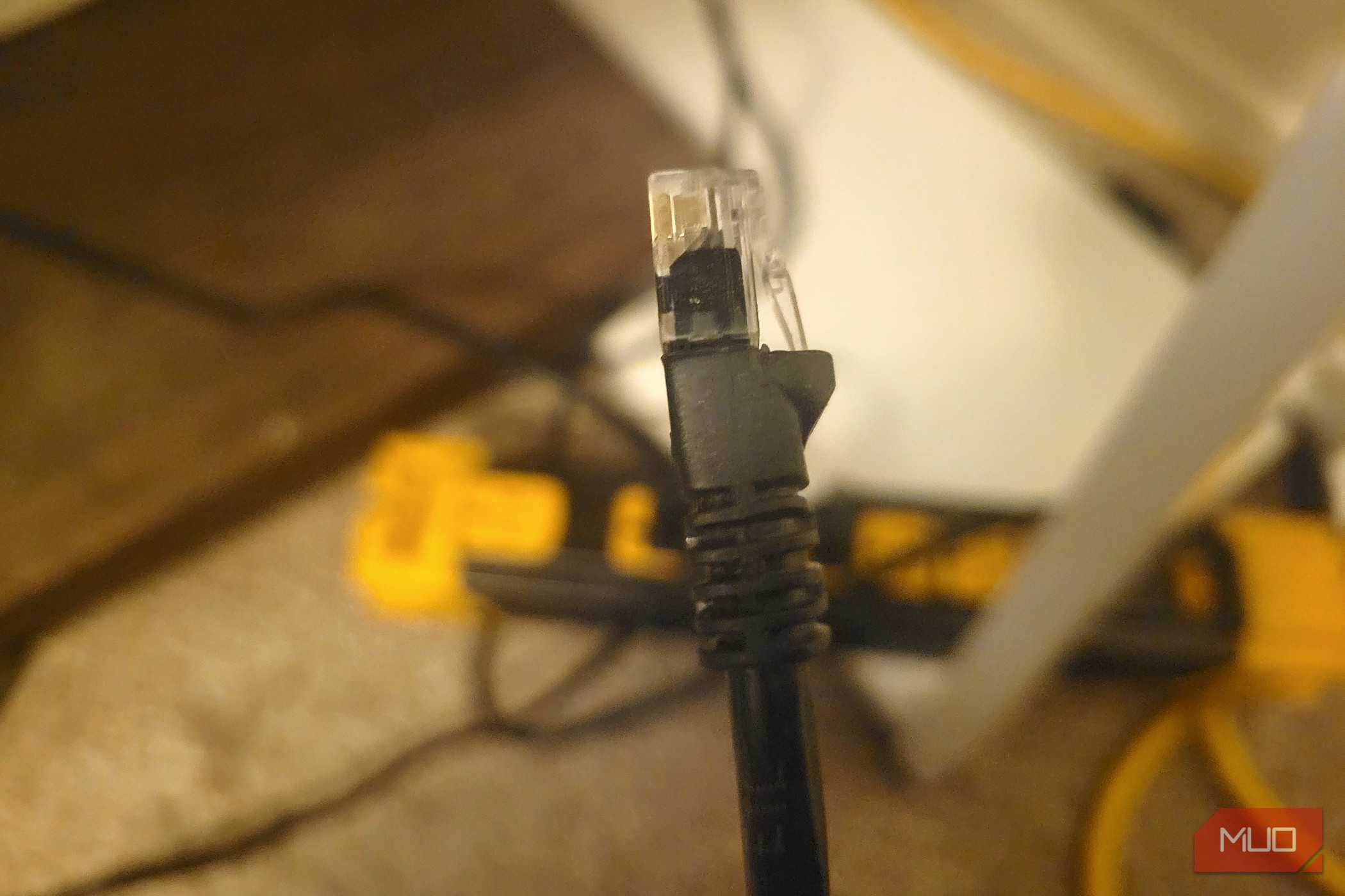 A good Ethernet cord in front of a power strip