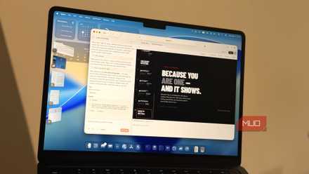 A laptop showing Claude Design working to make a slide deck