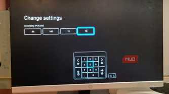 A Microsoft Xbox entering the DNS settings