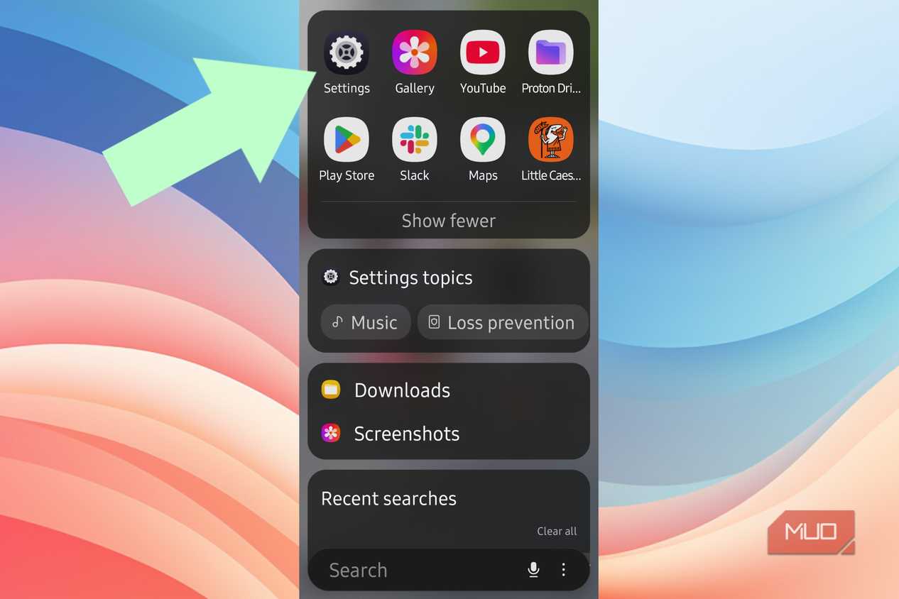 An arrow pointing to the Settings app in Android