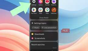 An arrow pointing to the Settings app in Android