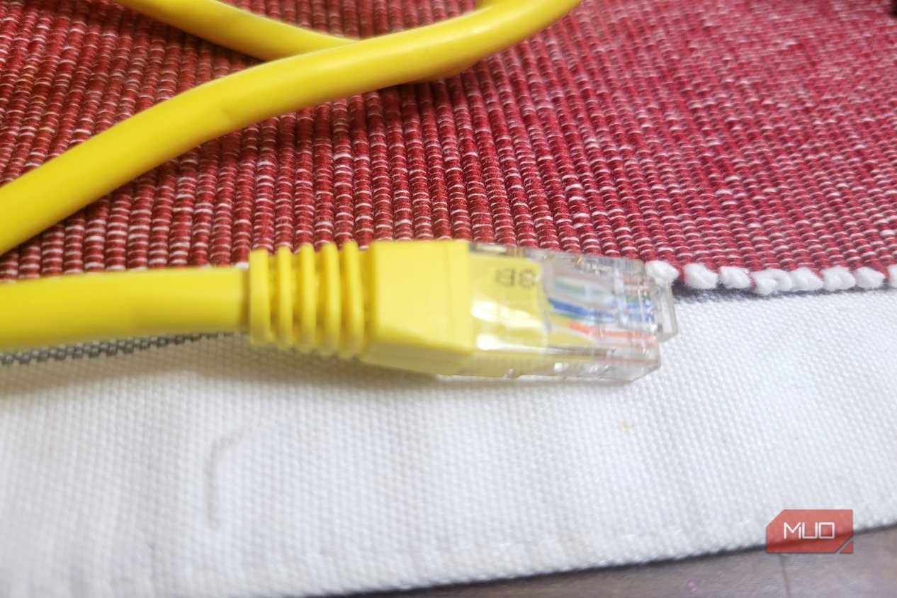An Ethernet cable on a white and red thing-2