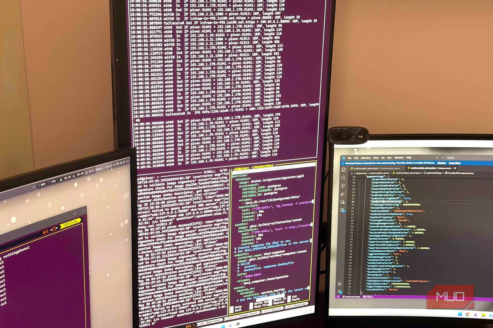 Close up of two monitors showing Zellij panes with network logs and code