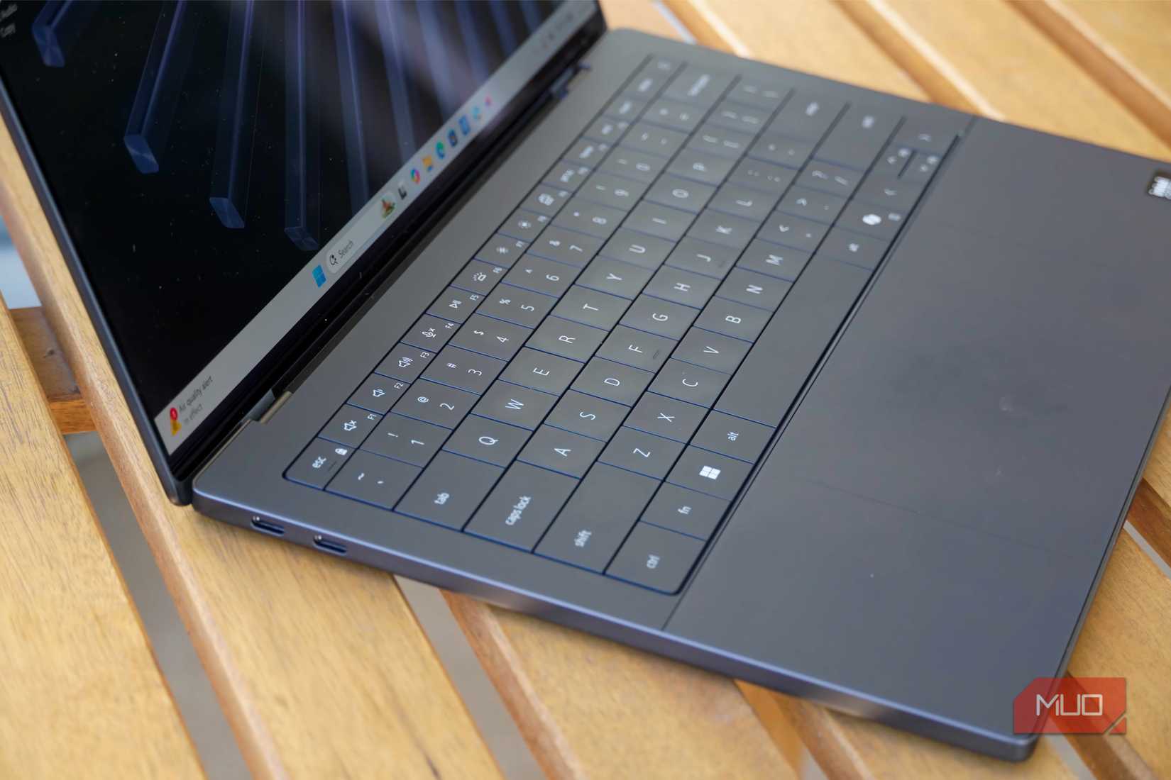 An angled view of the Dell XPS 14 keyboard and trackpad.