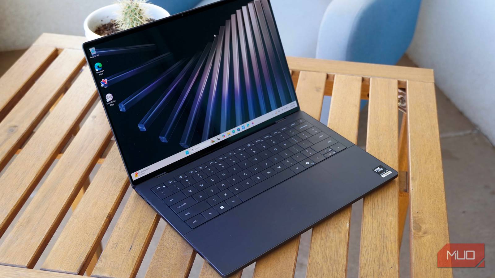 The Dell XPS 14 is almost a MacBook killer, but its keyboard and price leave you wanting more