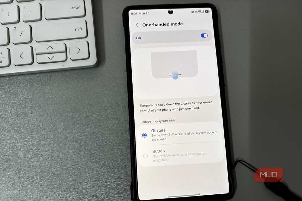One-handed mode makes large phone displays manageable for single-thumb use