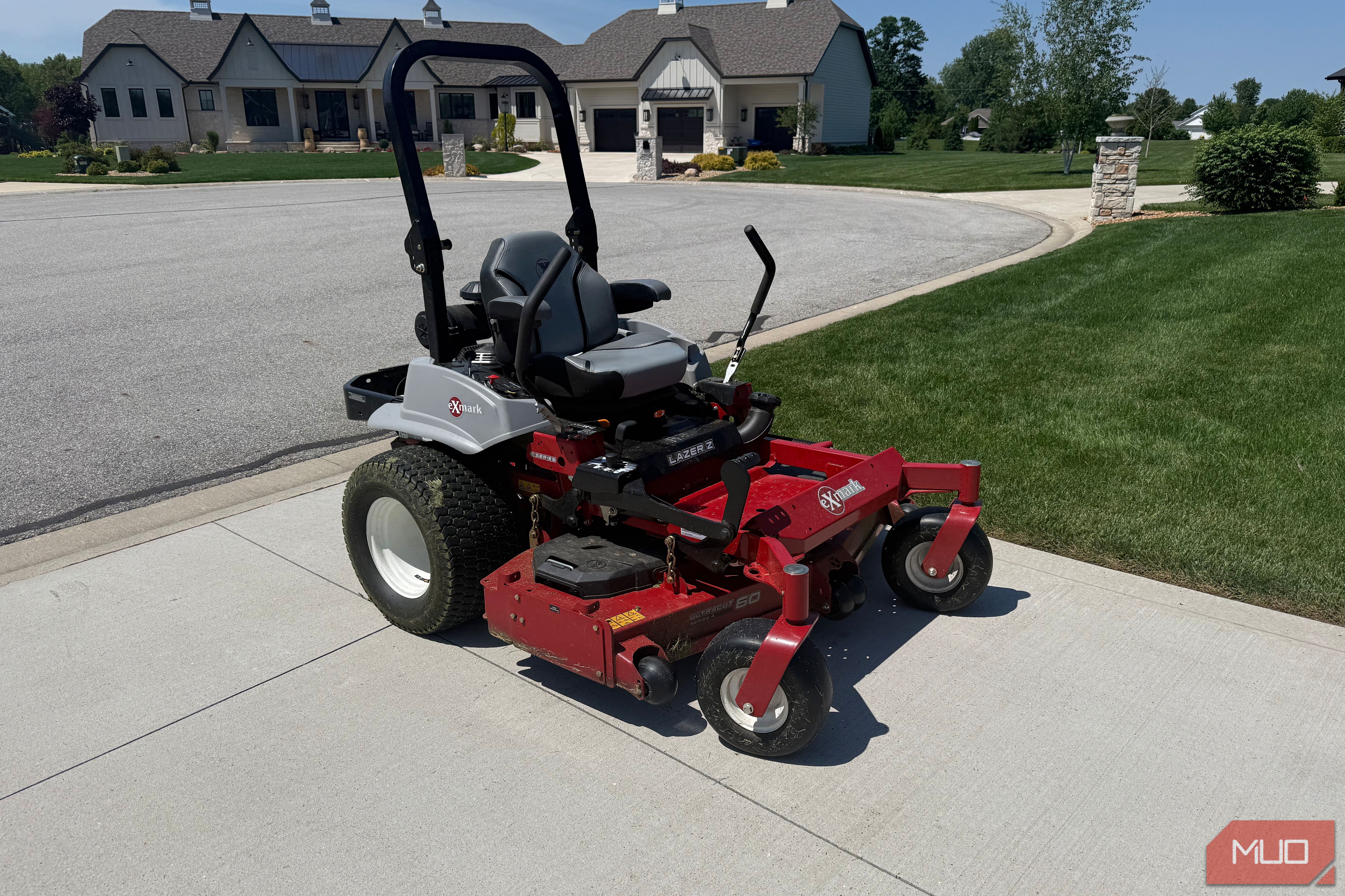 exmark lazer z mower on driveway