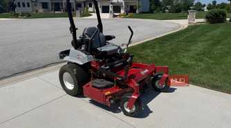 exmark lazer z mower on driveway