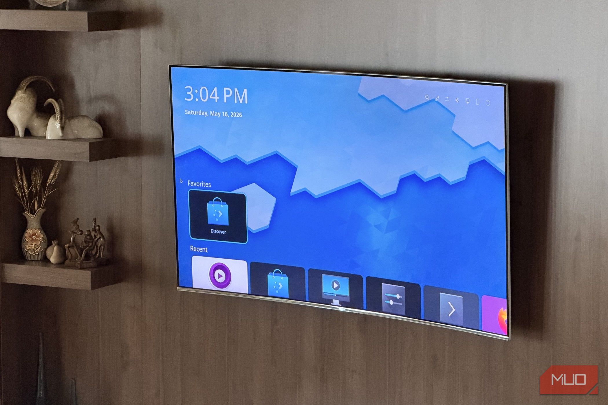 Far up shot of a smart TV running KDE Neon with Plasma Big Screen