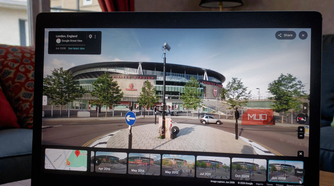 Laptop displaying a Google Maps Street View image from June 2008.