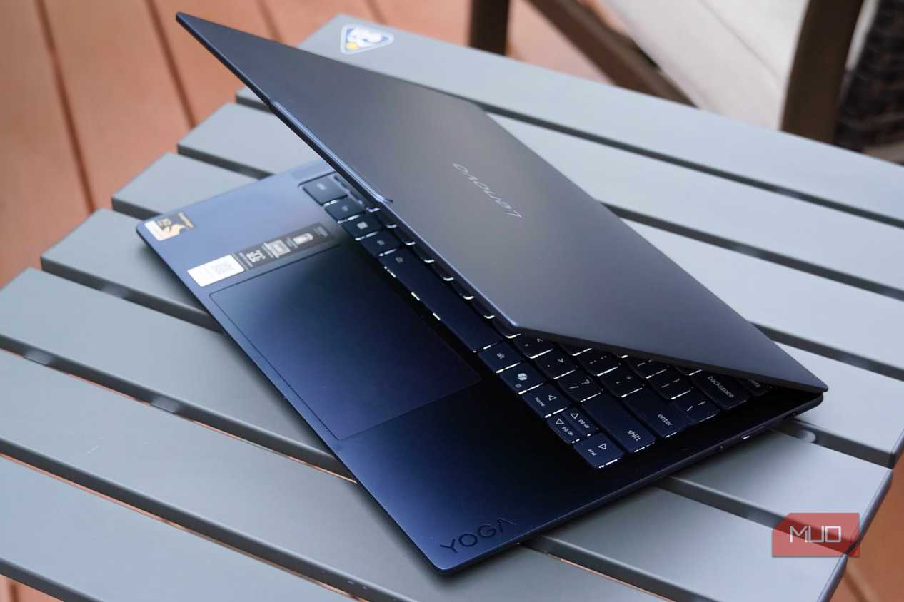 The Lenovo Yoga Slim 7x half-opened.