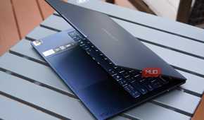 The Lenovo Yoga Slim 7x half-opened.