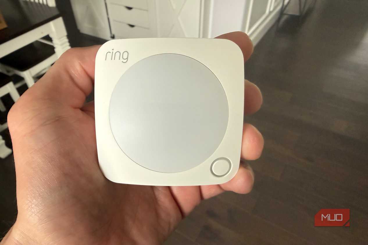 Ring Motion Sensor in hand front close up