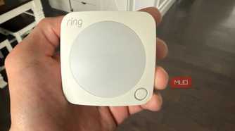 Ring Motion Sensor in hand front close up