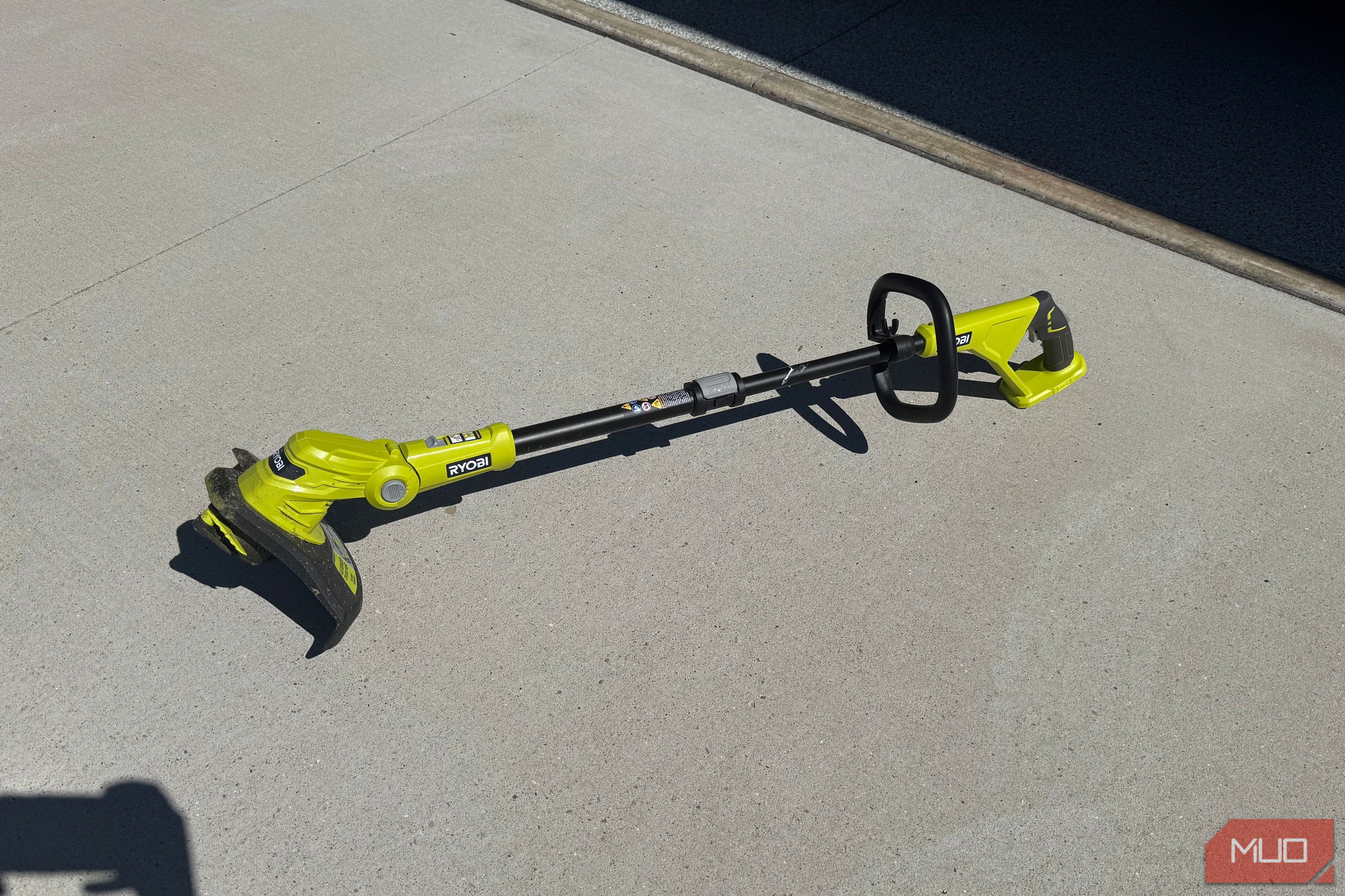 ryobi 18v string trimer on ground