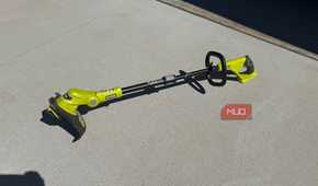 ryobi 18v string trimer on ground