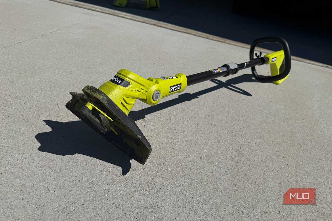 Ryobi 18v string trimmer on driveway outdoors