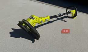 Ryobi 18v string trimmer on driveway outdoors