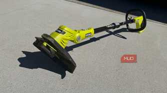 Ryobi 18v string trimmer on driveway outdoors