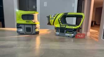 Ryobi power inverter and flashlight on desk angled view