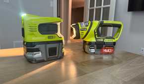 Ryobi power inverter and flashlight on desk lights on