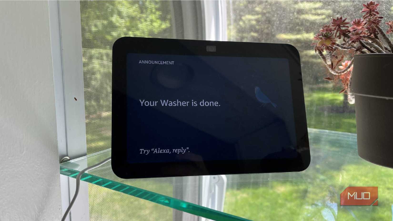 A notification on an Amazon Echo Show 8 showing a Samsung smart washer is finished.