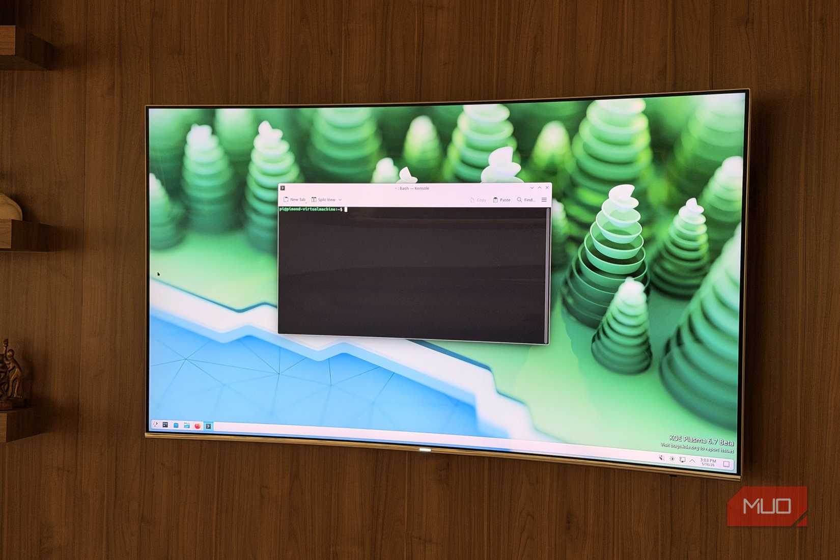 The terminal in KDE Neon on a TV screen