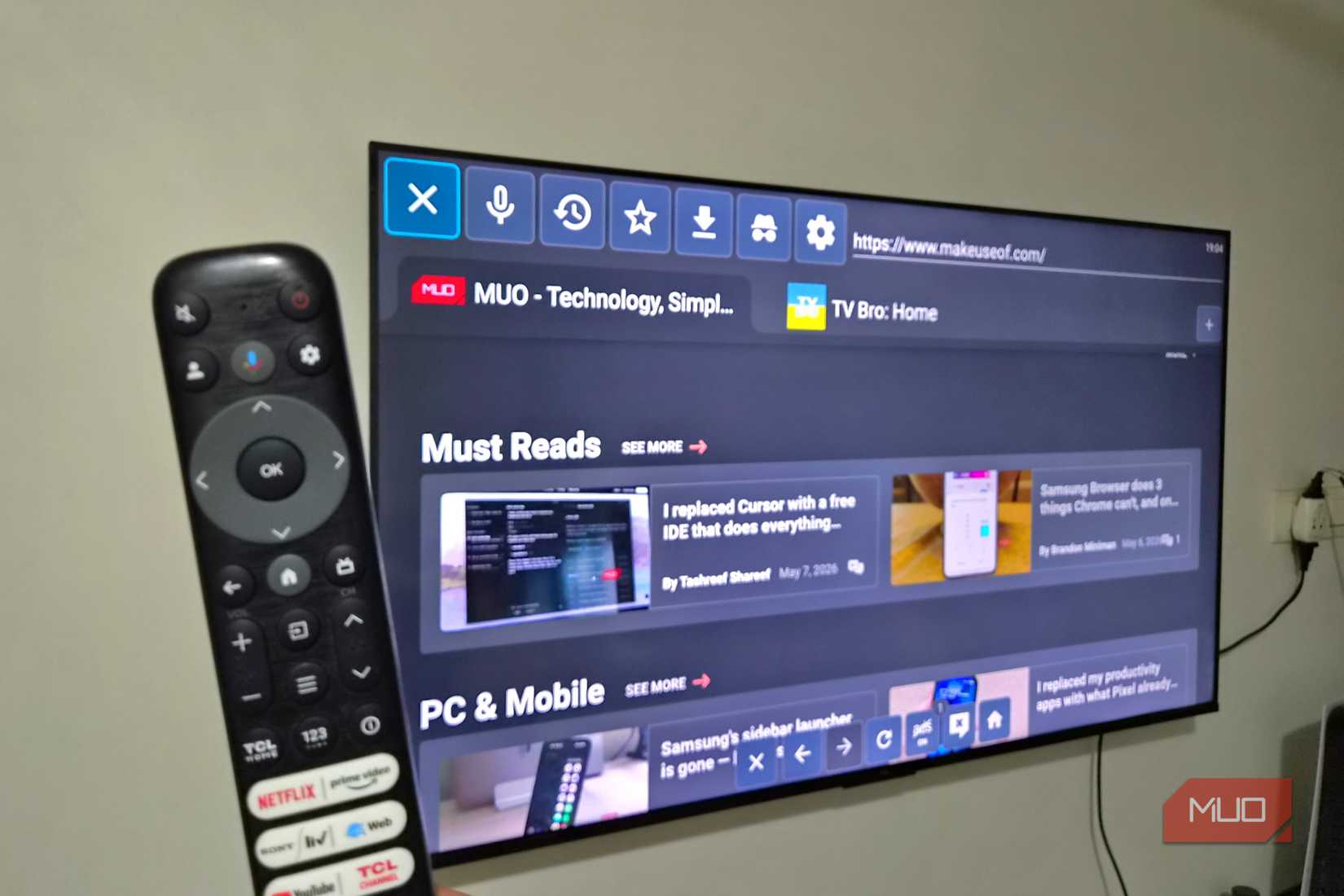 TV showing TV Bro browser and a remote in front