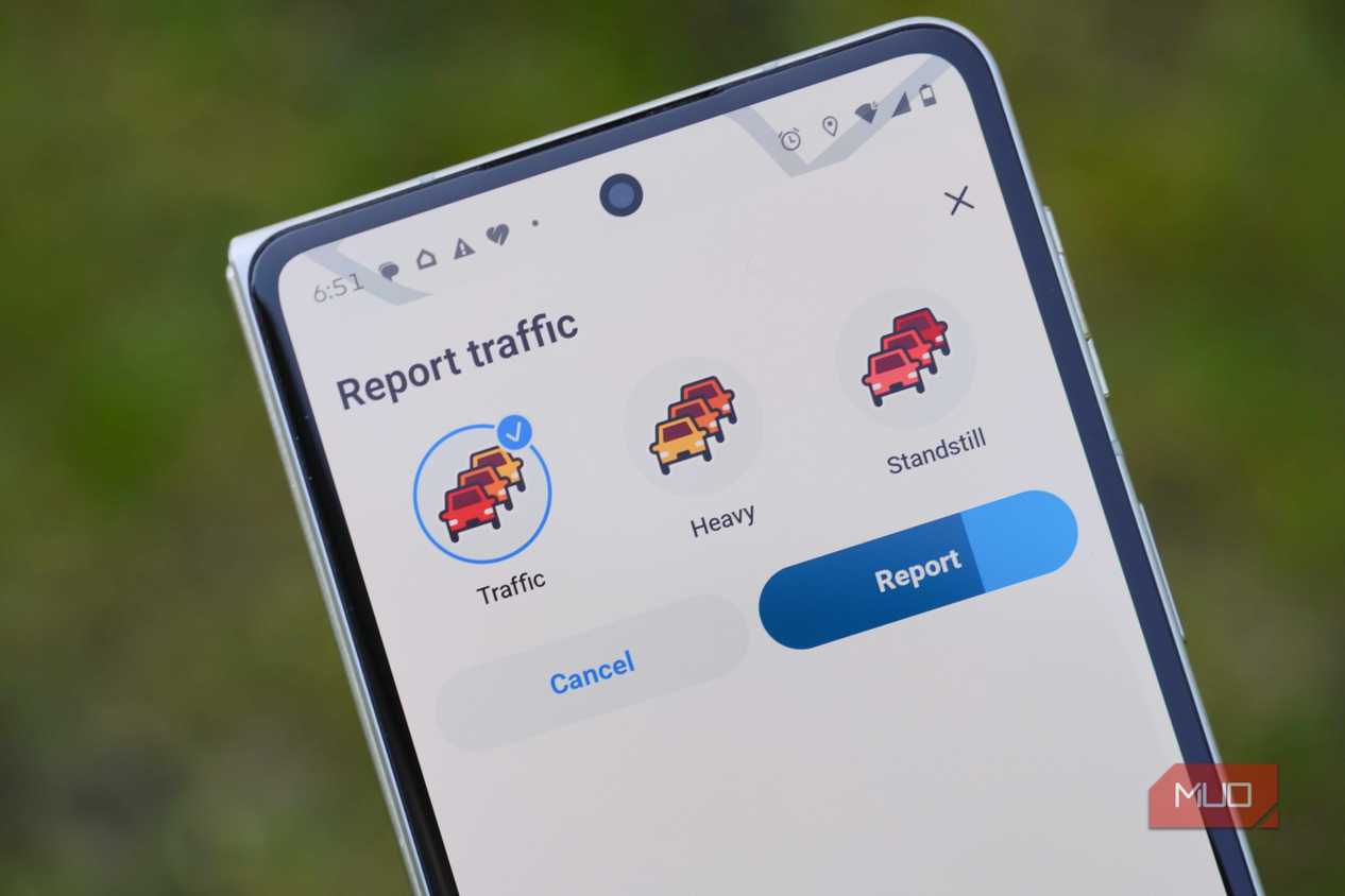 Reporting traffic in the Waze app.