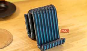 3D printed phone holder empty front view showing ribbed black blue filament.