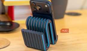 3D printed phone holder rear view with iPhone camera and ribbed support.